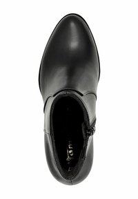 Bottine en cuir noir à bout pointu, fermeture éclair sur le côté et doublure intérieure douce. Texture lisse avec un minimalisme dans les détails.