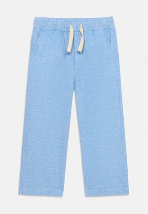 Lysblå snor-bukser med elastisk midje og sidelommer, laget av mykt linstoffblandingsmateriale, lagt flatt på hvit bakgrunn.
