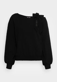 Svart sweatshirt med bred rund halsringning, samlade långa ärmar och en rosettdetalj på vänster axel med rhinestones.