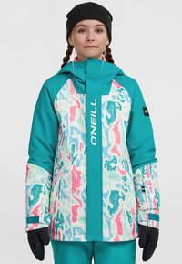Teal og hvid snejakke med abstrakte pink og blå mønstre, justerbar hætte, lynlåset front og sorte handsker. Har O'Neill logo.