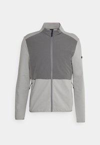 Veste zippée pour homme à manches longues, bicolore grise, avec col montant et poches latérales sur fond uni.