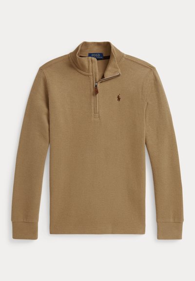 Brown zip-up pullover sweater with long sleeves, ribbed texture, and a small logo on the left chest. Features a high collar and zipper.