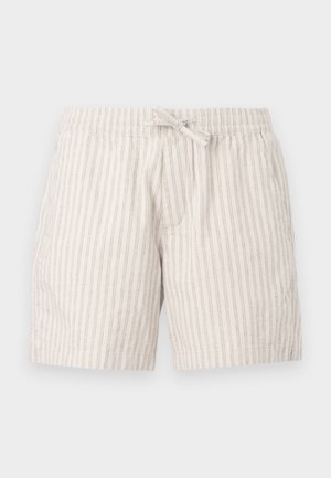 Lys beige shorts lavet af tekstureret stof med tynde lodrette striber, der har et elastisk taljebånd og en dekorativ snørebånd.