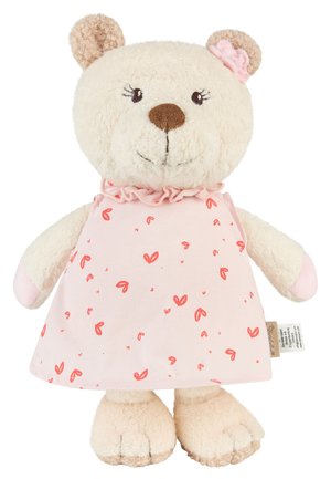 Plush teddy bear with beige fur, wearing a pink dress with red heart patterns and a pink flower on its left ear.