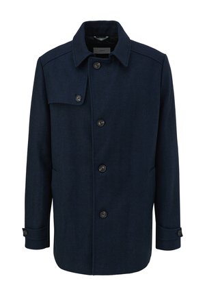 Manteau en mélange de laine bleu marine avec texture en chevron, grand col, cinq boutons et poches latérales. Design mi-long sur mesure.