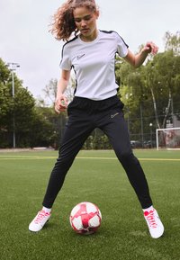 Nike Performance ACADEMY PANTS - Treningo apatinė dalis - black/metallic gold