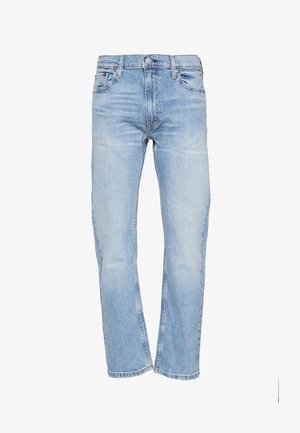 Ljusblå denimjeans med rak passform, featuring en knapp- och dragkedjestängning, fem fickor och subtil blekning på tyget.