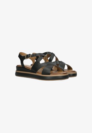 Zwarte leren sandalen met gekruiste banden, verstelbare enkelgesp, gevoerde zool en een chunky, twee-kleurige zool.
