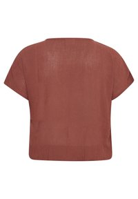 Braune Bluse mit kurzen Ärmeln und lässiger Passform. Weicher, strukturierter Stoff mit rundem Ausschnitt und leicht abgerundetem Saum.