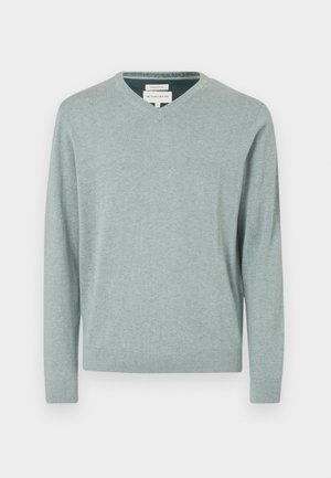 Svetlozelený v-neck sveter vyrobený z bavlny, s dlhými rukávmi a rebrovanými manžetami a lemom. Hladká textúra s minimálnym logom.