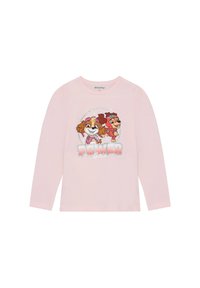 Helles rosa Langarmshirt mit einem grafischen Motiv von zwei Cartoondogs und dem Text "Power Girls" in glitzernden Buchstaben. Weiche Stofftextur.