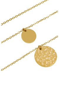 Collana d'oro con due pendenti circolari; uno liscio e lucido, l'altro con una texture a motivo martellato, entrambi su una catena delicata.