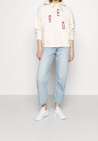 Levi's® Jersey con capucha - off-white