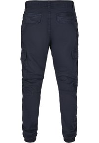 Navy cargo pants with an elastic waistband, two side pockets, and two back pockets. Material appears durable with a smooth texture.