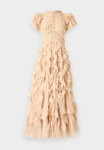 Robe maxi dans une douce couleur nude, avec un design à volants, des sequins éparpillés, des manches bouffantes et un décolleté en V. Fabriquée en tissu léger et texturé.