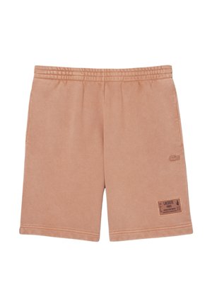 Pantaloni corti marrone chiaro realizzati in tessuto morbido con una cintura elastica. Presenta una tasca laterale e un'etichetta di marca all'orlo.