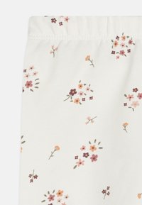 Lindex FLOWER UNISEX - Legingi — bikses - light dusty white