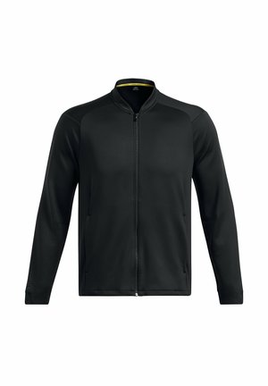 Sort zip-jacke med lange ærmer, lavet af glat stof. Har høj krave og skrå sidelommer. Enkel og strømlinet design.