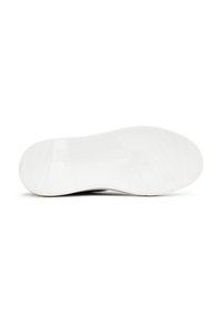 Rubber sneaker sole in white, featuring a textured surface with a wave pattern and a flat, rounded shape. No branding visible.