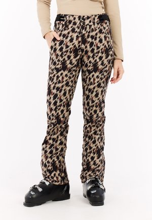 Skibukser med leopardprint i beige, brune og sorte nuancer. Har et tætsiddende design, en robust talje og synlige sidelommer.
