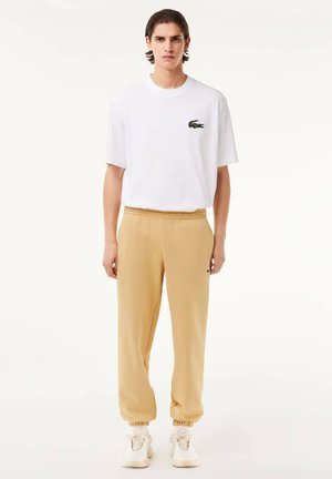 Pantalones deportivos - beige ixq