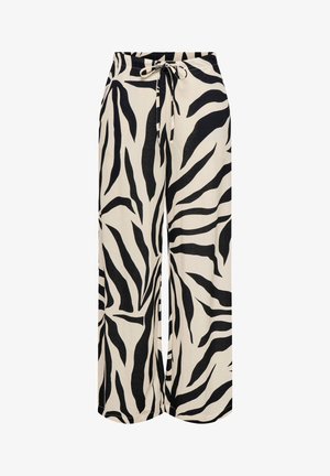 Bukser med vide ben i sort-hvid zebraprint og snor i taljen.