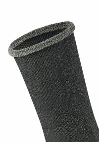 Chaussette en maille grise avec une finition texturée, présentant une base foncée et un revers gris clair contrastant. Le design est effilé en haut pour un ajustement confortable.
