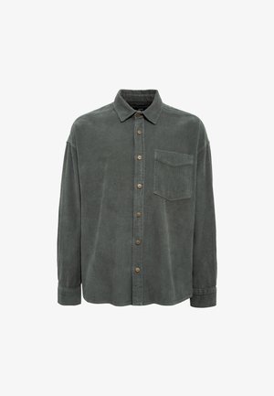 Dunkelgrünes Cordhemd mit Knopfleiste, spitzem Kragen, einer Brusttasche und Holzknöpfen. Weicher Stoff mit gerippter Struktur.