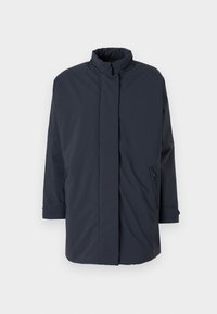 Manteau bleu marine à manches longues avec un col haut, des poches latérales zippées et une coupe droite. Fabriqué en tissu lisse et résistant à l'eau.