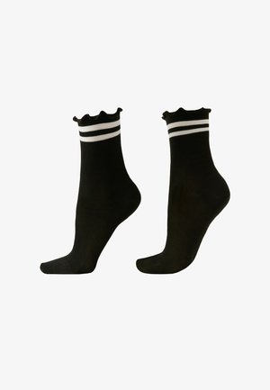Black socks with a ruffled top and two white stripes at the cuff. Material appears smooth; design is fitted and simple.