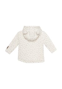 Giacca con cappuccio trapuntata di colore crema con un piccolo motivo floreale rosa, maniche lunghe e orlo arrotondato. Presenta un patch con logo sulla manica sinistra.