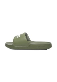Green rubber slide sandal with a wide strap, featuring a small white logo on the front and textured sole for grip.