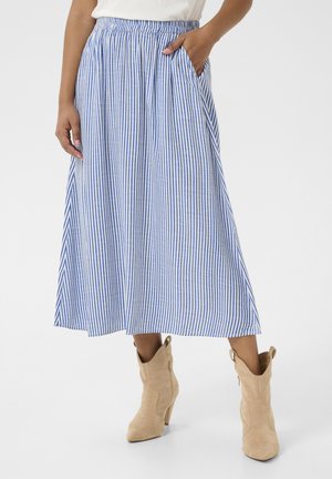 Blue and white striped midi skirt with an elastic waistband and side pockets, paired with beige ankle boots.