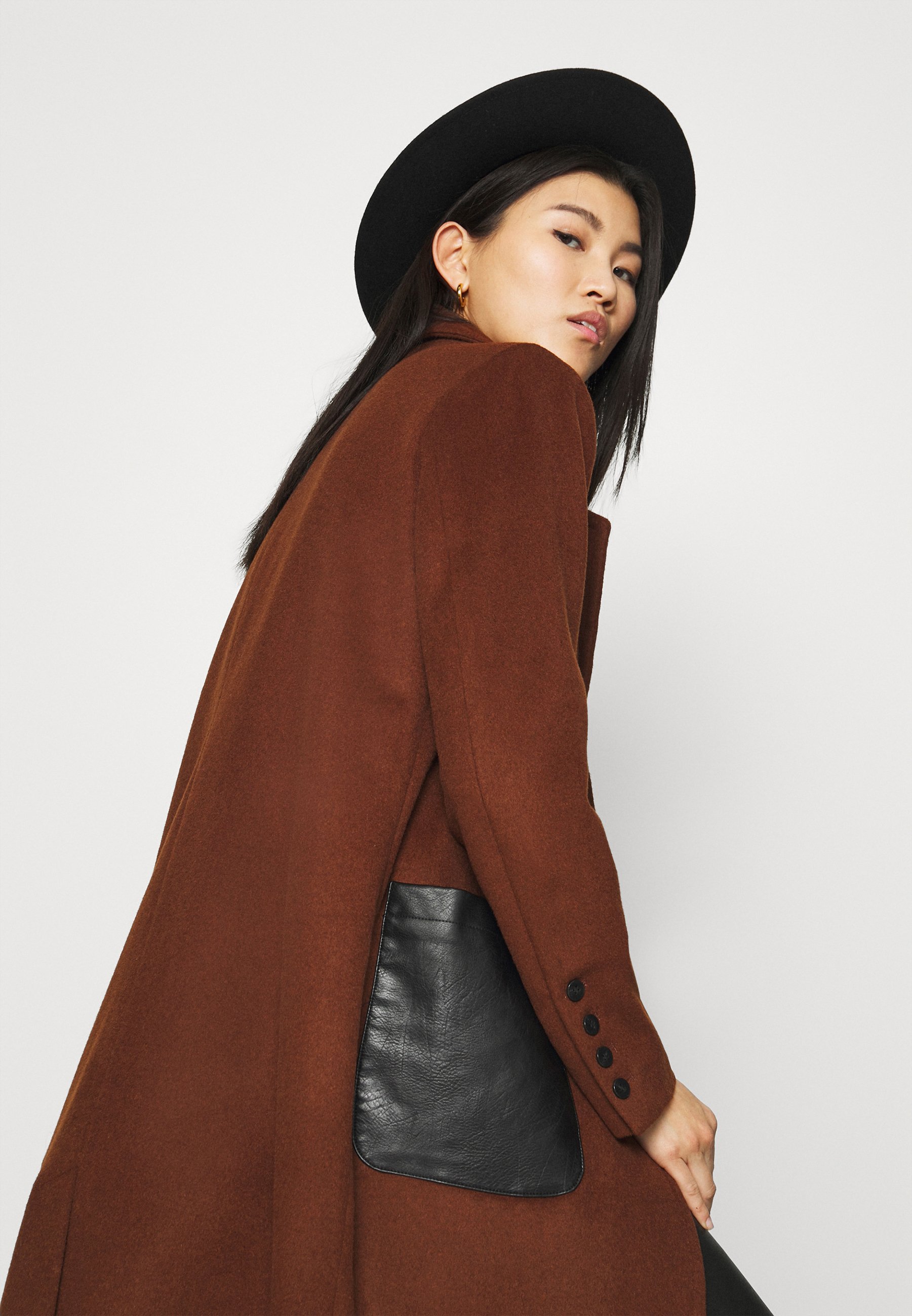 dark tan coat