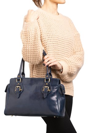 Navy leather handbag with double handles, gold hardware accents, and external side pockets. Textured finish, structured design, and rectangular shape.