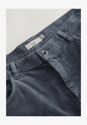 Gray corduroy pants with straight fit design, featuring a sturdy waistband, metal button closure, and textured, ribbed fabric.