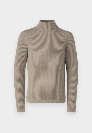 Beige gerippter Rollkragenpullover mit langen Ärmeln, der eine enganliegende Silhouette und ein strukturiertes Strickmuster aufweist. Hergestellt aus einem weichen Material.