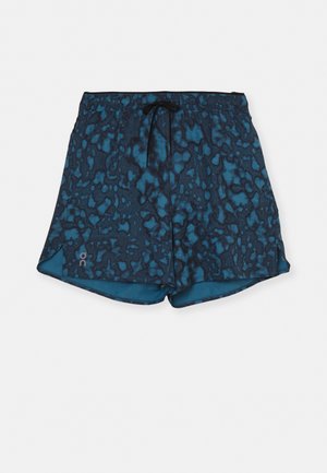 Blaue gemusterte Shorts aus weichem Stoff, mit einem Kordelzugbund, seitlichen Schlitzen und einem glatten Innenfutter.