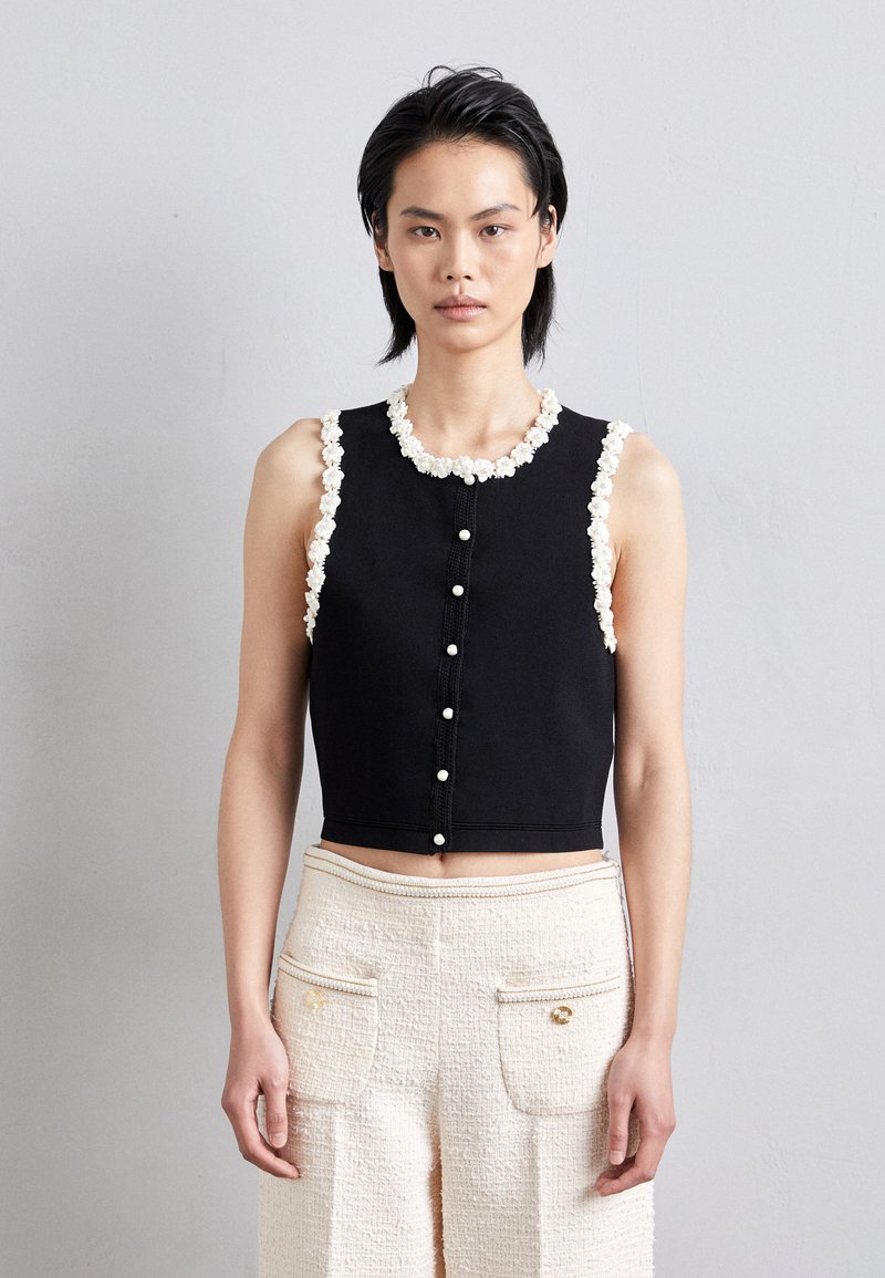 sandro CARDIGAN SANS MANCHE DETAIL GIRLY - Brezrokavnik - noir