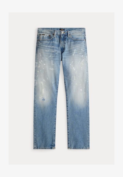 Jean en denim bleu clair avec éclaboussures de peinture et une petite déchirure sur la cuisse gauche, vue de face, avec cinq poches et une fermeture à bouton.