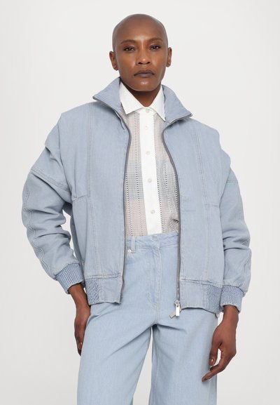 REMAIN COCOON PANTS - Široke nogavice - light blue
