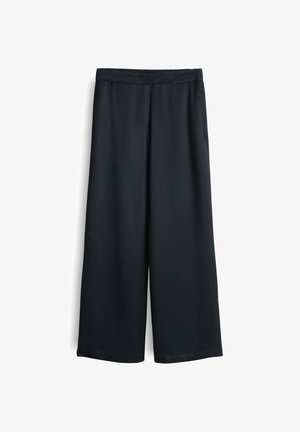 Geräumige, dunkelblaue Hose mit einem elatischen Bund, ausgestattet mit zwei seitlichen Taschen und einem glatten, leichten Stoff.
