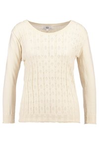 Kremowy dzianinowy sweter z długimi rękawami, zdobiony wzorem w diamenty i ściągaczami przy mankietach oraz u dołu. Miękka tekstura, lekka konstrukcja.