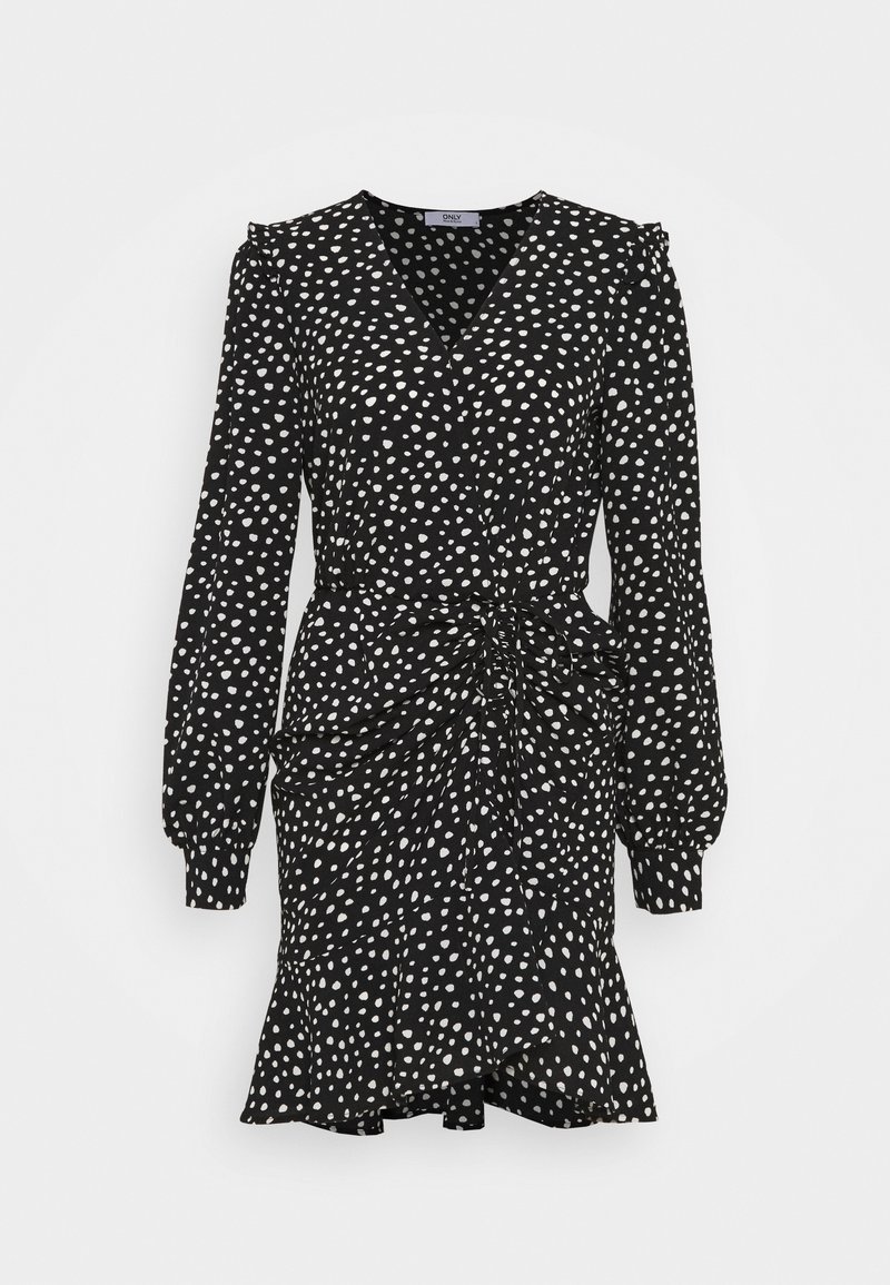 Robe portefeuille noire à manches longues avec pois blancs irréguliers, taille froncée, encolure en V et ourlet évasé.