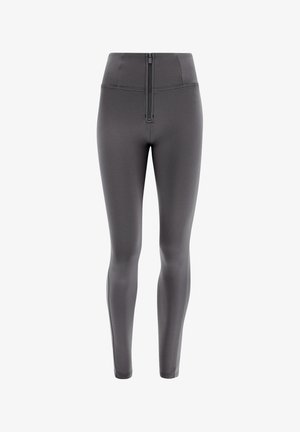 Graue Leggings mit hohem Bund, ausgestattet mit einem Reißverschluss vorne und einem glatten, dehnbaren Material für einen figurnahen Look. Keine Muster oder Akzente.