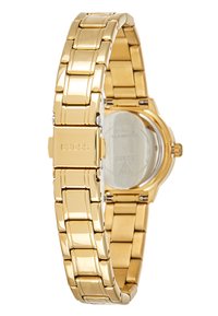Reloj de pulsera de metal dorado con un acabado suave y pulido. Presenta un diseño de brazalete de eslabones y una caja redonda con un fondo de cuarzo transparente.
