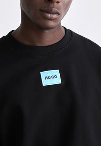 HUGO DIRAGOL - Bluză de molton - schwarz