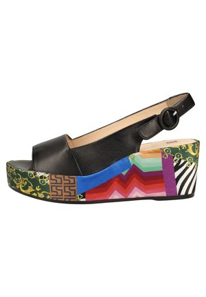 Black leather sandal with a slingback strap and circular buckle. Features a multicolored patterned wedge sole with various designs and textures.