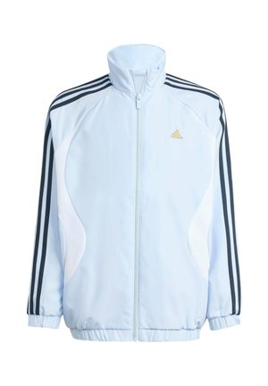 Jasnoniebieska bluza sportowa Adidas z czarnymi paskami na ramionach, pełnym zamkiem z przodu, elastycznymi mankietami i złotym logo Adidas na piersi.