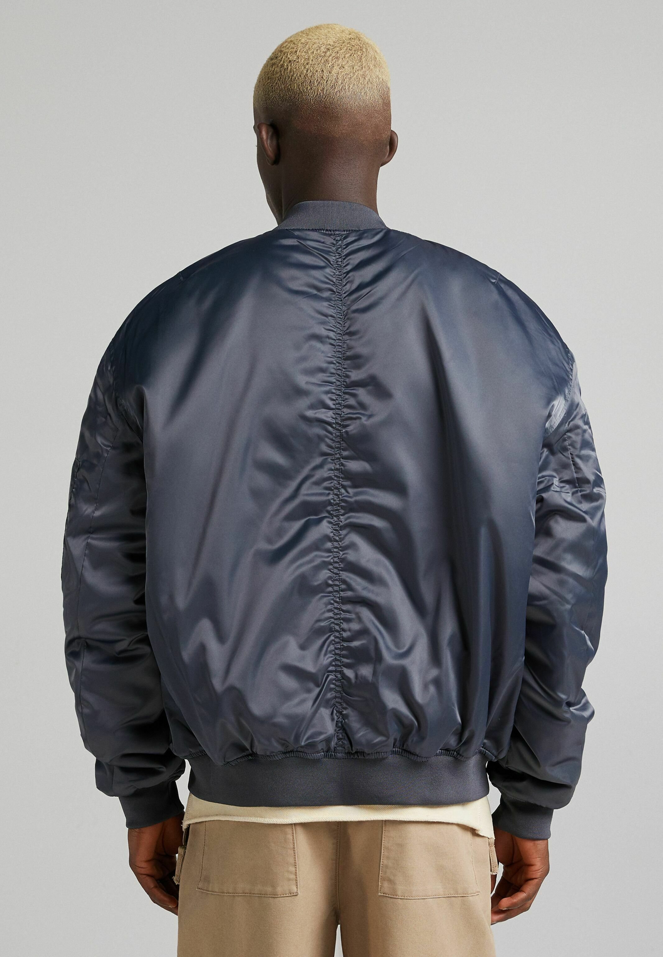 grey quilted bomber jacket